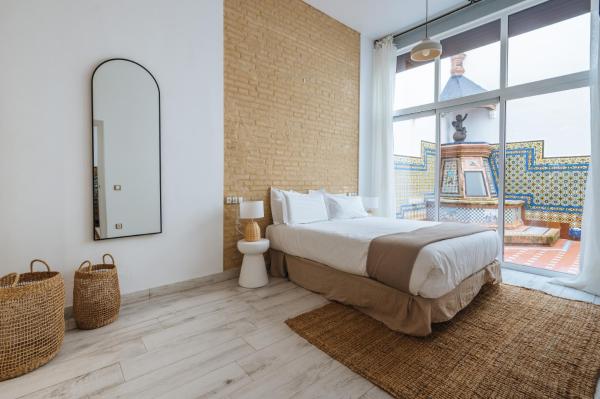 Apartamentos "El Escondite de Triana", Varaa Huoneistohotelli Triana Sevilla, lähellä Edificio Expo