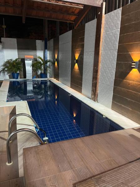 Casa com piscina em Carapibus - Jacumã, Varaa Lomakoti Bahia hotellit, joissa on uima-allas, Uima-allas