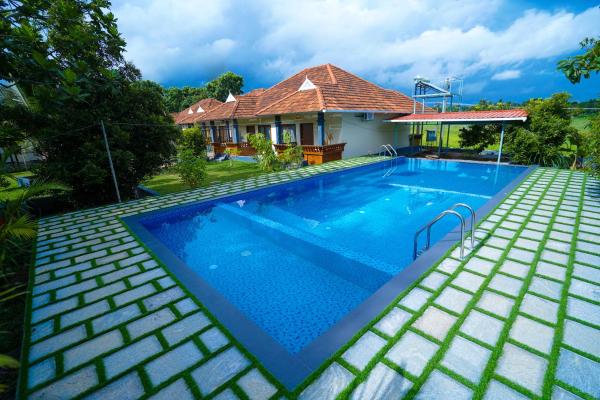 KOTTACKAL NATURE INN, Varaa  Angamali hotellit, joissa on uima-allas, Uima-allas