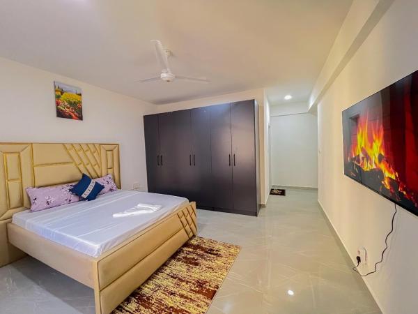 Madzo Holiday homes, Varaa  Hotellit Coast Region uima-altaalla, Uima-allas