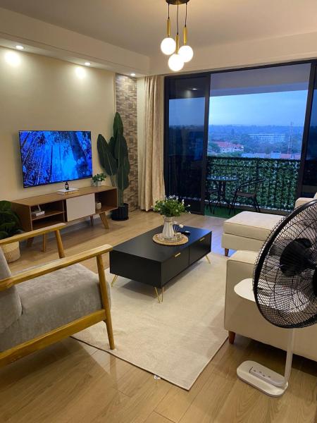 urban loft retreat apartment with fully equipped gym ,heated swimming pool, private parking and relaxing rooftop with breath taking views, Varaa Huoneisto Nairobi Nairobi