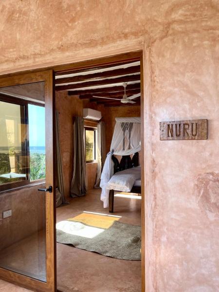 Nuru Room at Lulu Sands, Varaa  Hotellit Coast Region pysäköinnillä, Pysäköinti